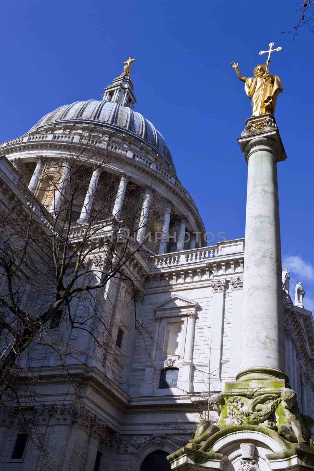 The impressive St. Paul's Cathedral and the Statue of Saint Paul in London.