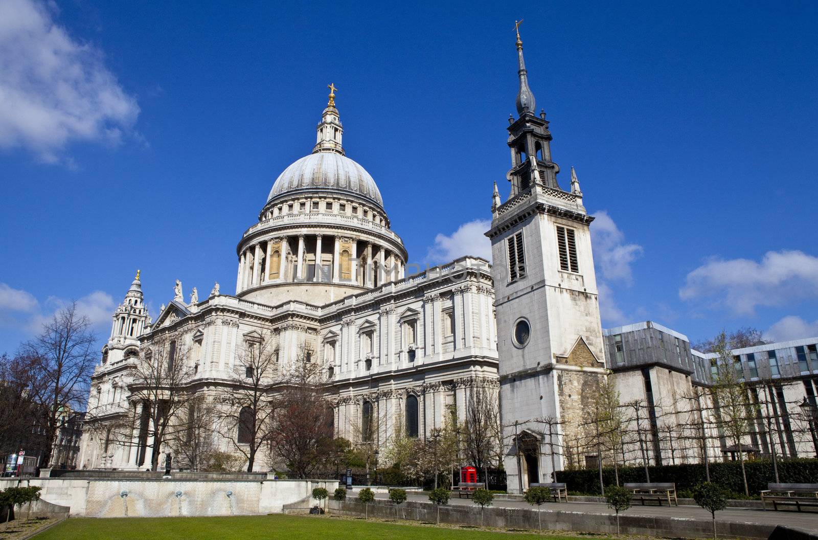 St. Paul's Cathedral and the Tower of the former St. Augustine Church (now the St. Paul's Cathedral Choir School) in London.