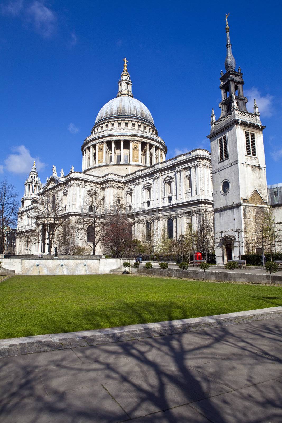 St. Paul's Cathedral and the Tower of St. Augustine Church (now the St. Paul's Cathedral Choir School) in London.