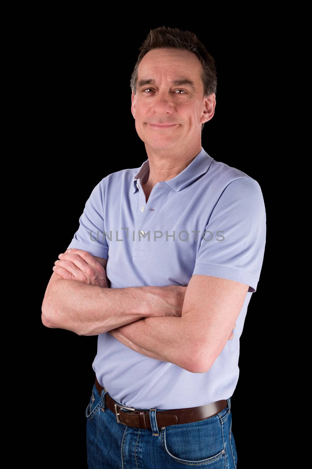 Portrait of Smiling Happy Middle Age Man Arms Folded Black Background