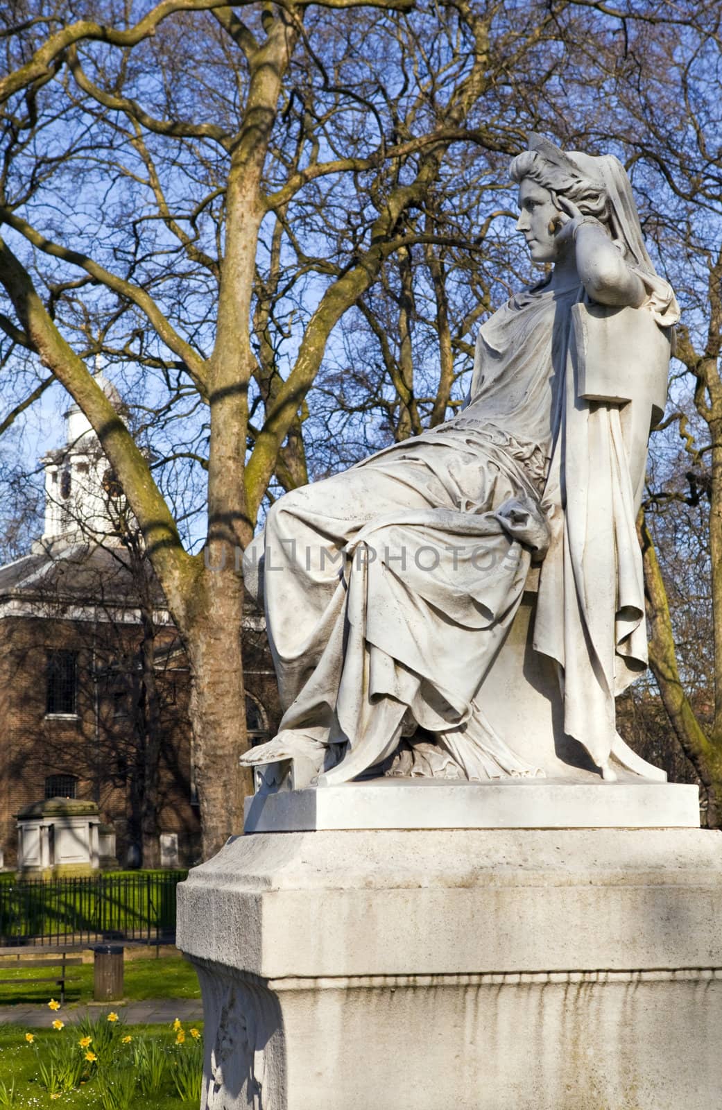 Sarah Siddons statue on Paddington Green with St.Mary's Church in the background, London.
