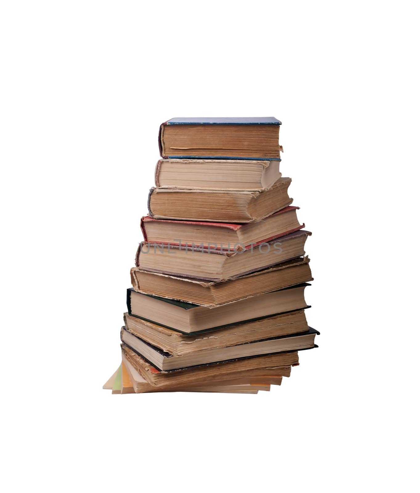 A few old books, stacked, isolated on a white background