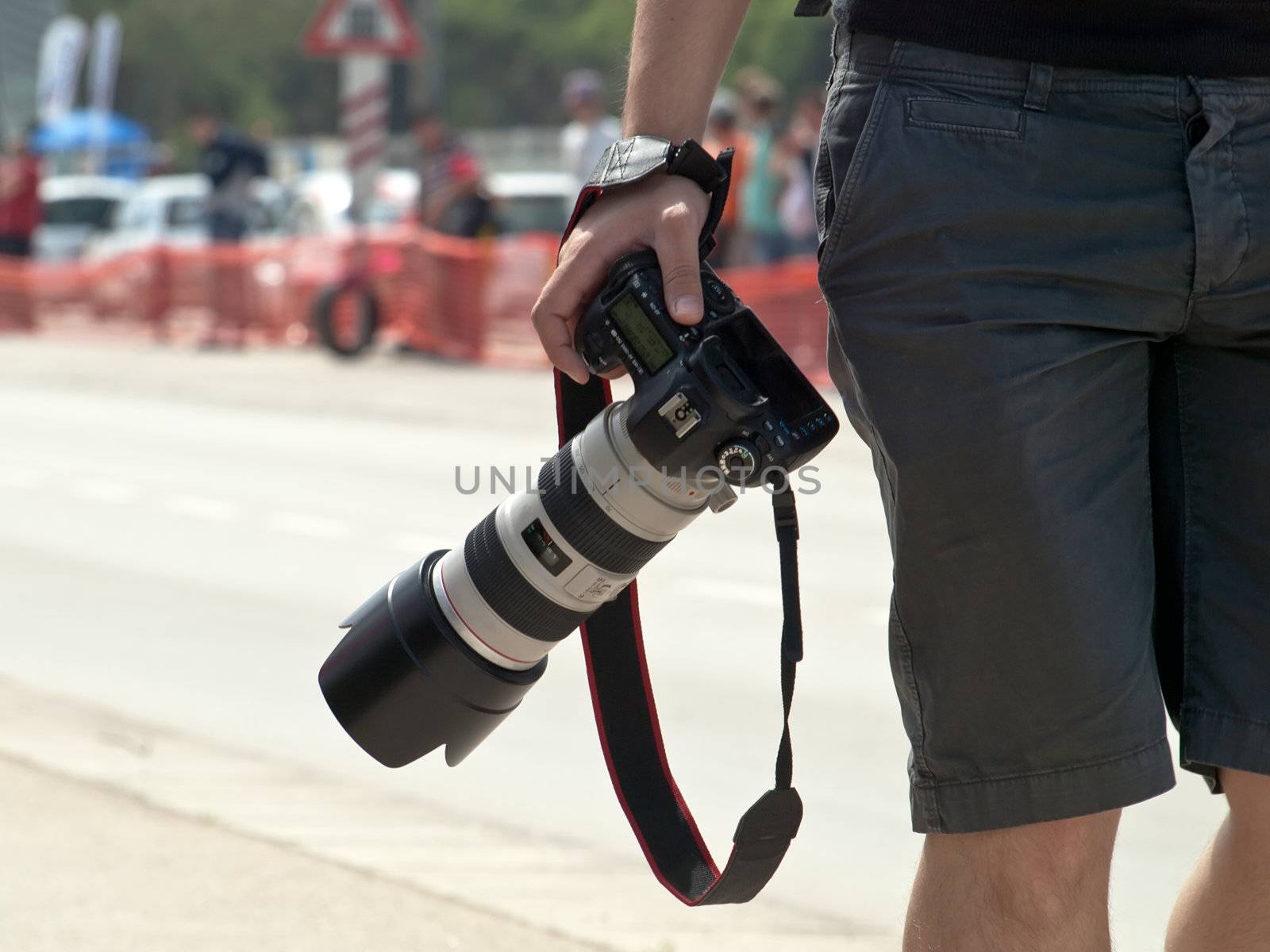 photographer takes a best place for shooting