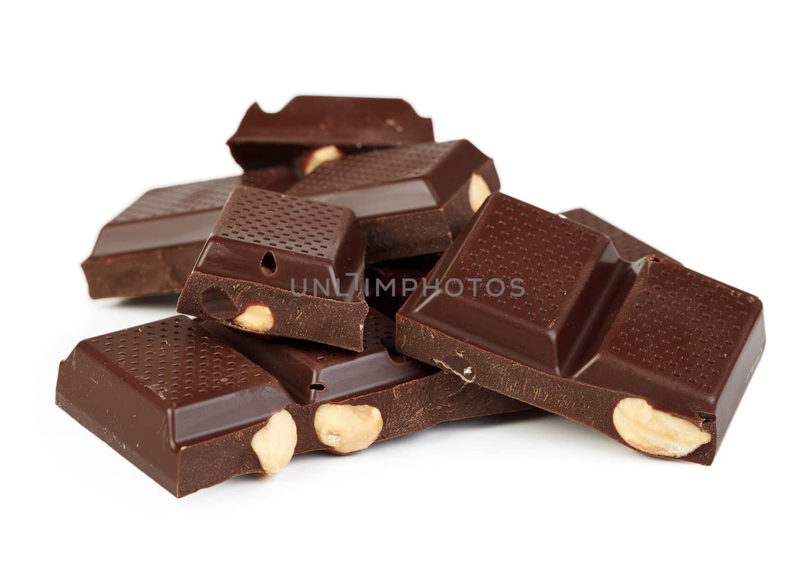 Delicious dark chocolate pralines isolated on white by mdmmikle