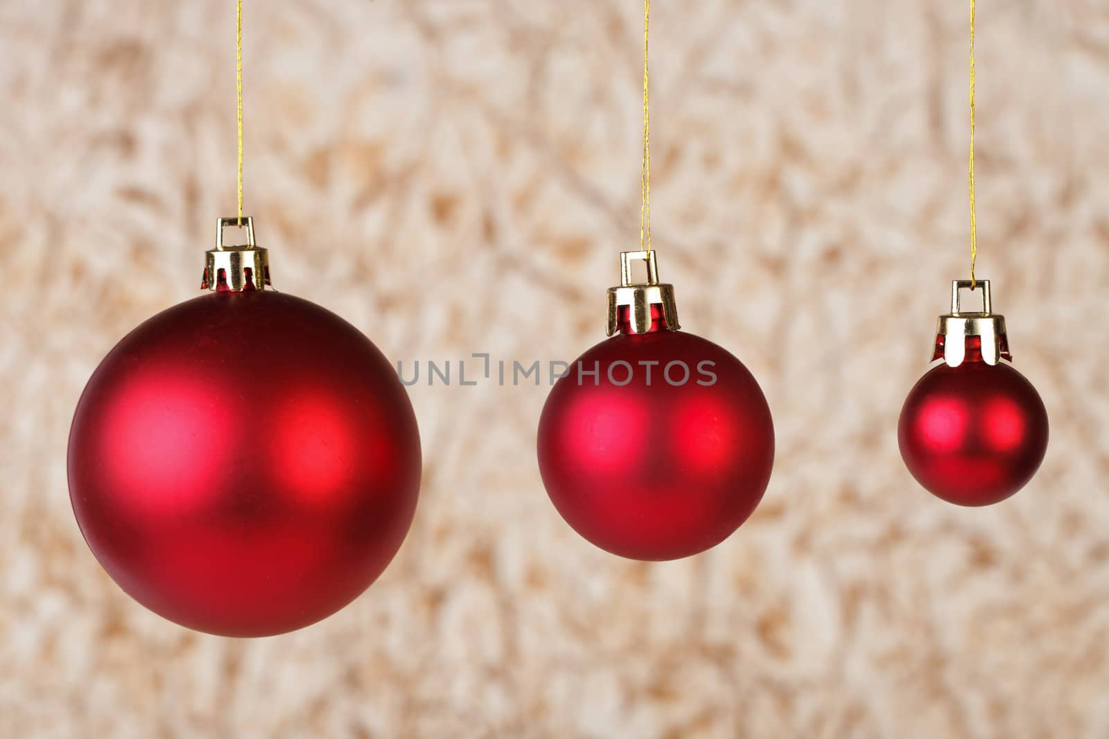 Three red balls on abstract background by mdmmikle