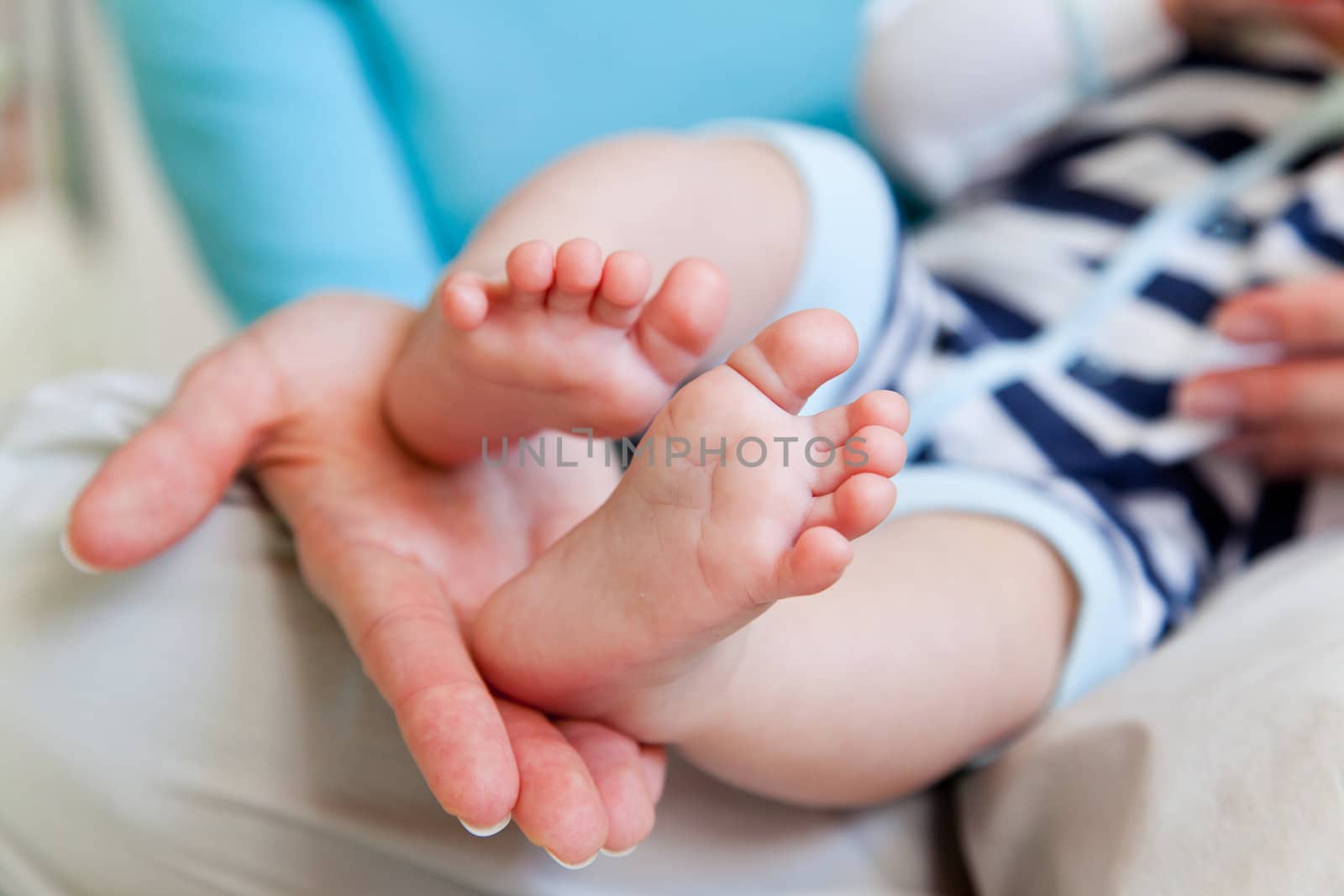 Mothers hand and the Baby`s Feet by mdmmikle