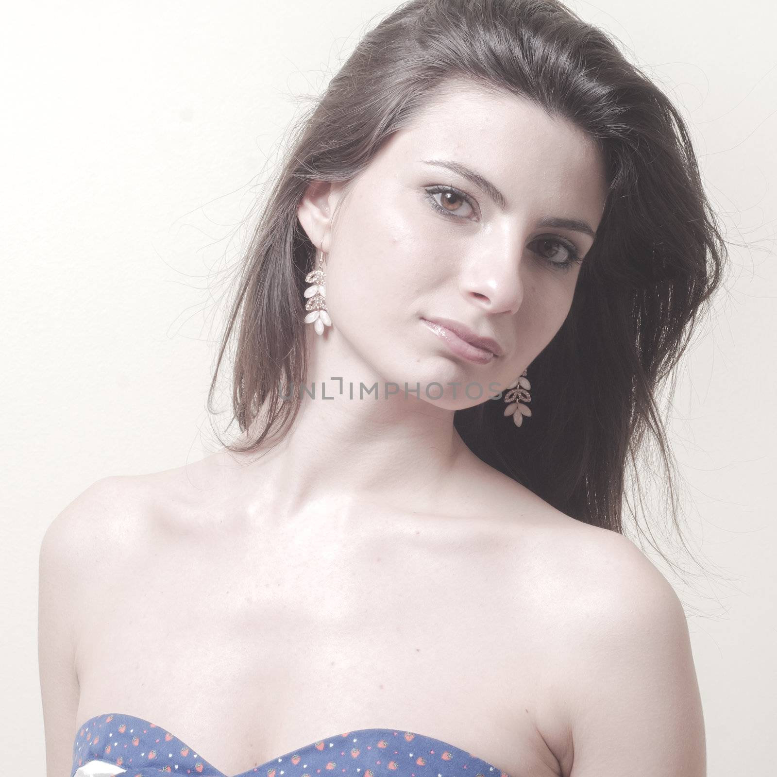 vintage portrait of young woman on vignetting background