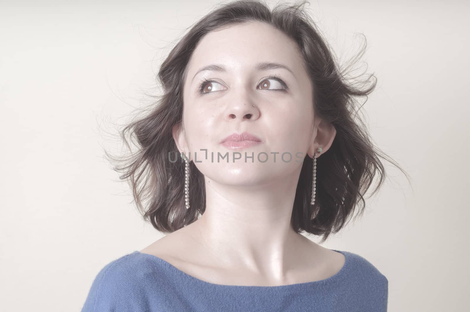 vintage portrait of young woman on vignetting background