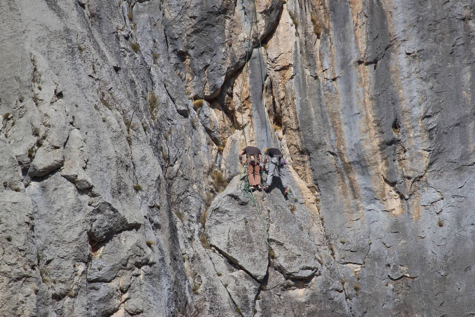 Two rock climbers climbing in Paklenica national park, Velebit mountain, Croatia