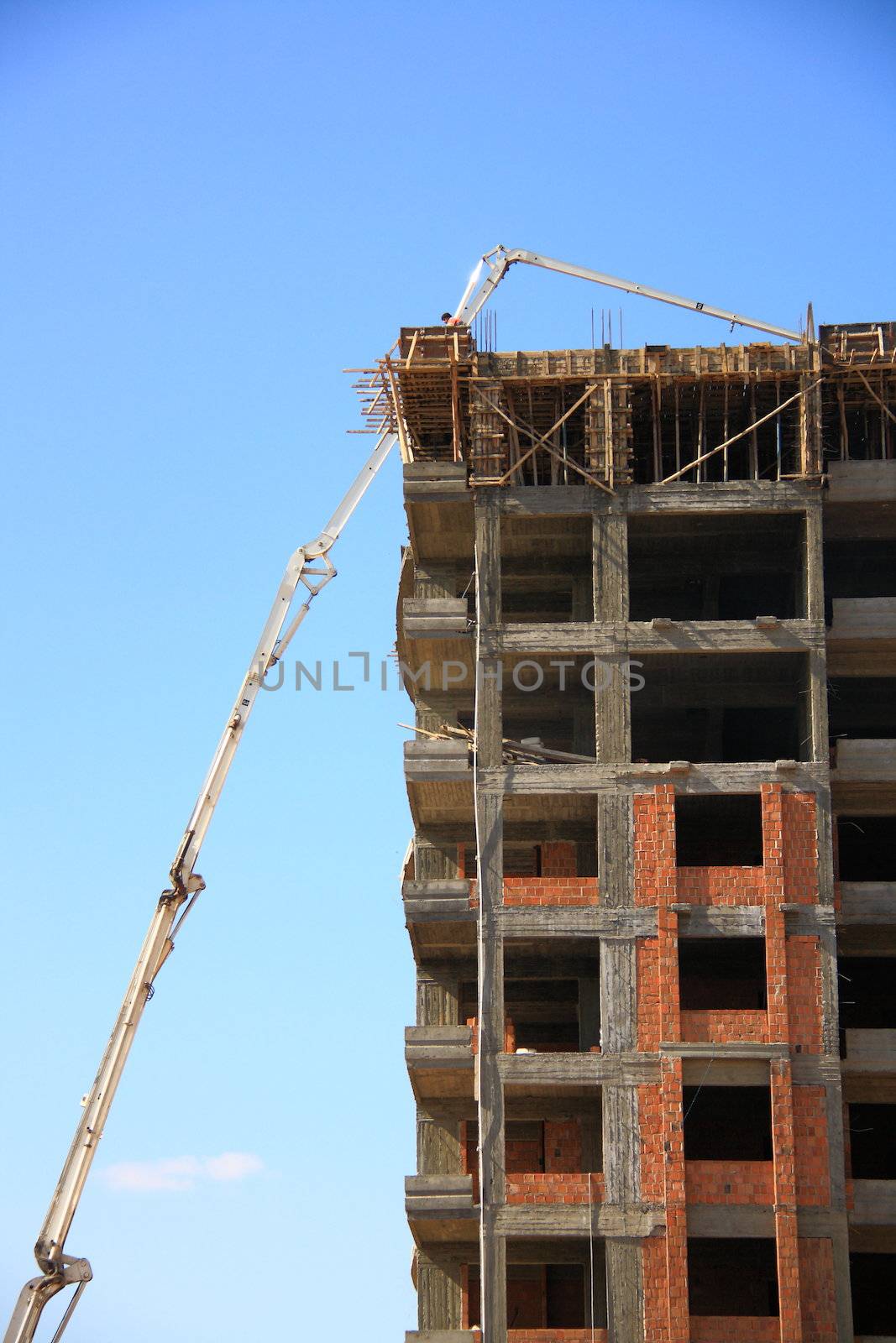 construction of building with cement mixture machine