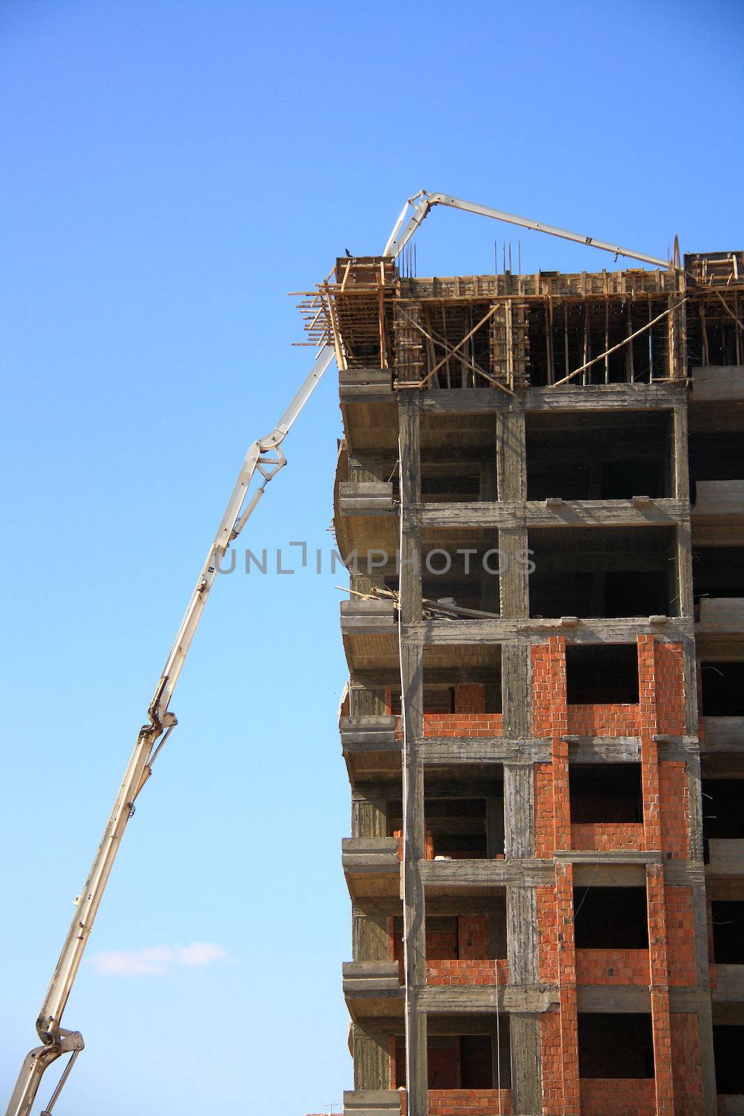 construction of building with cement mixture machine