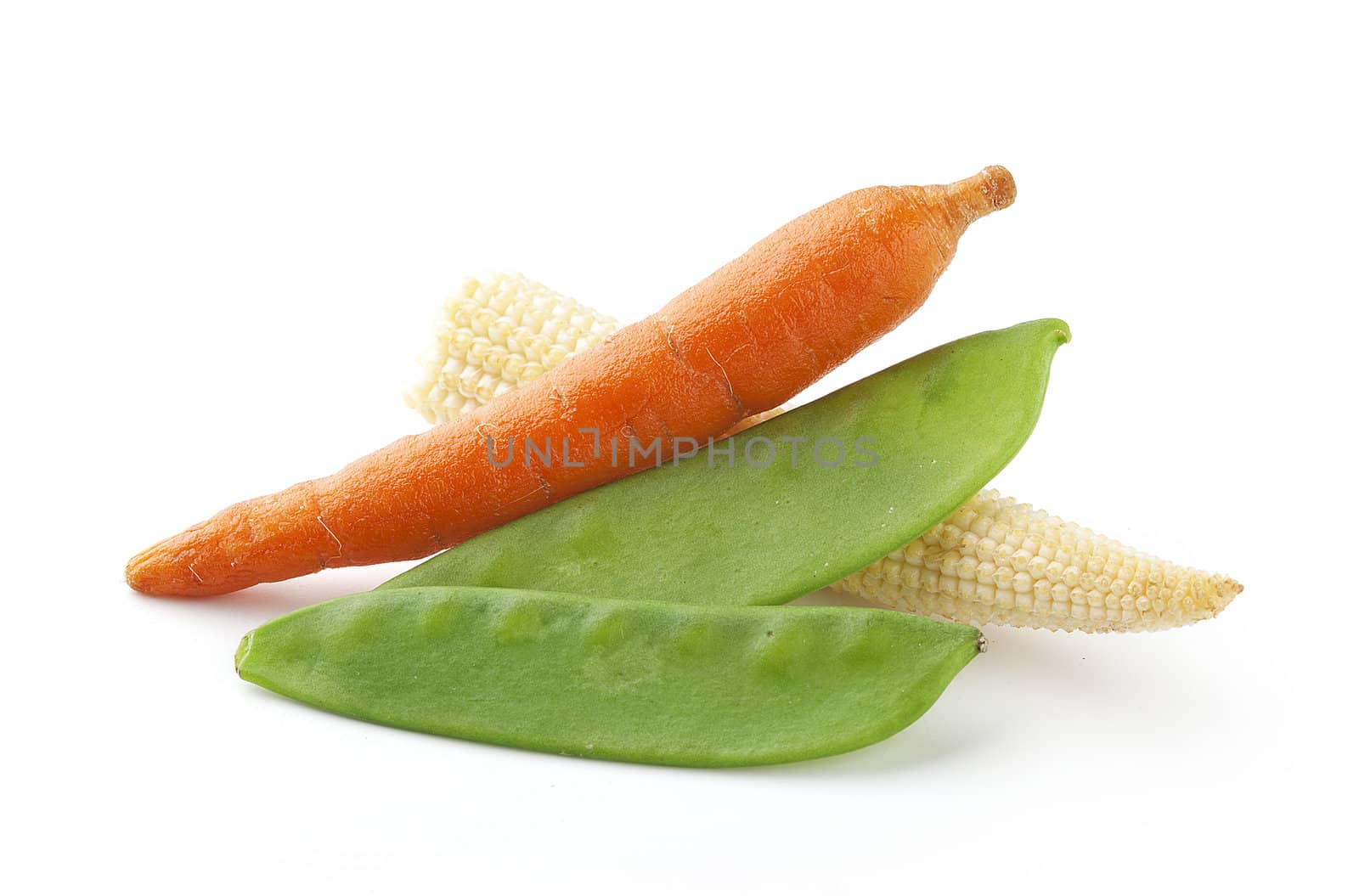 Corn, carrot and green peas on the white background