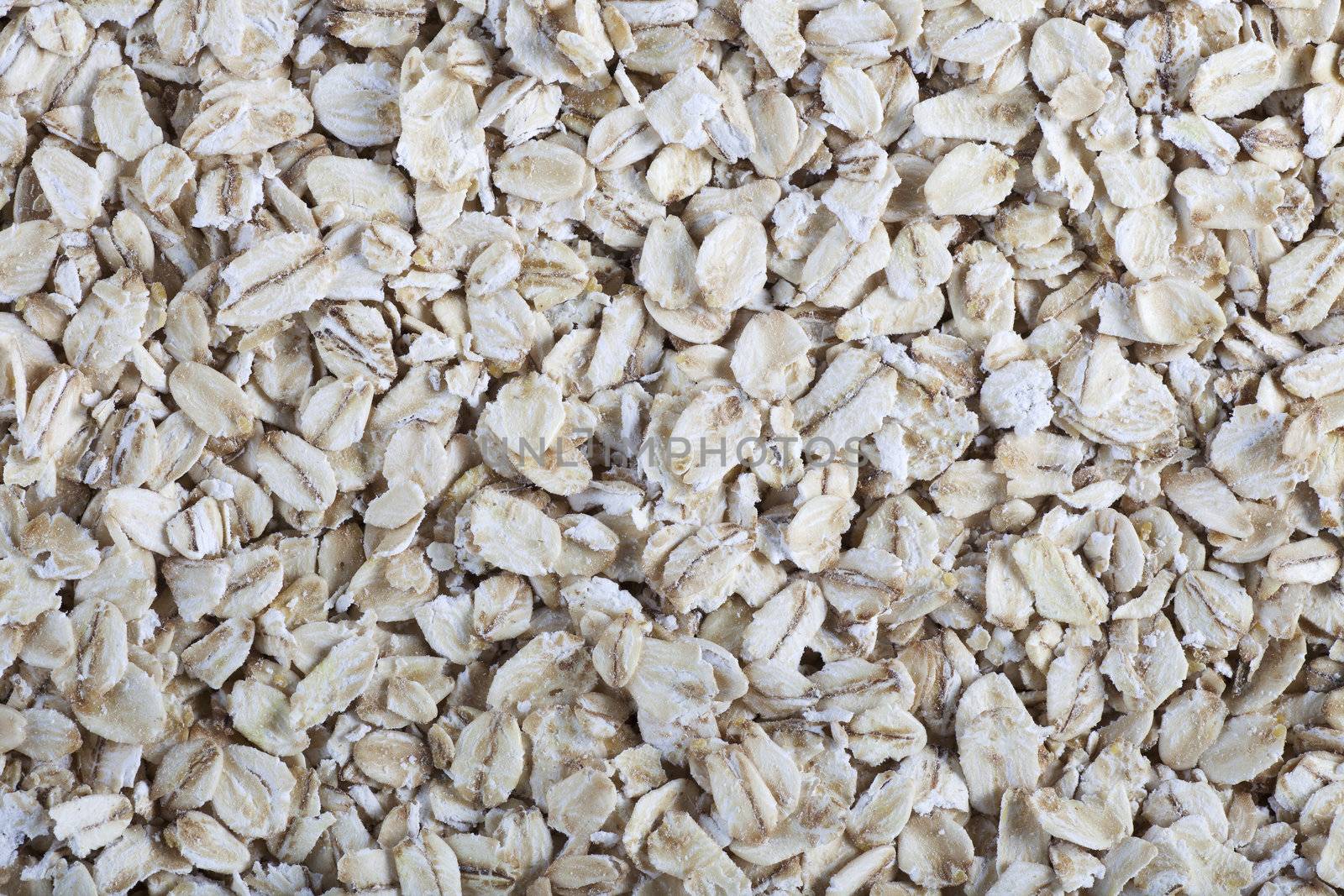 Rolled oats food background or texture
