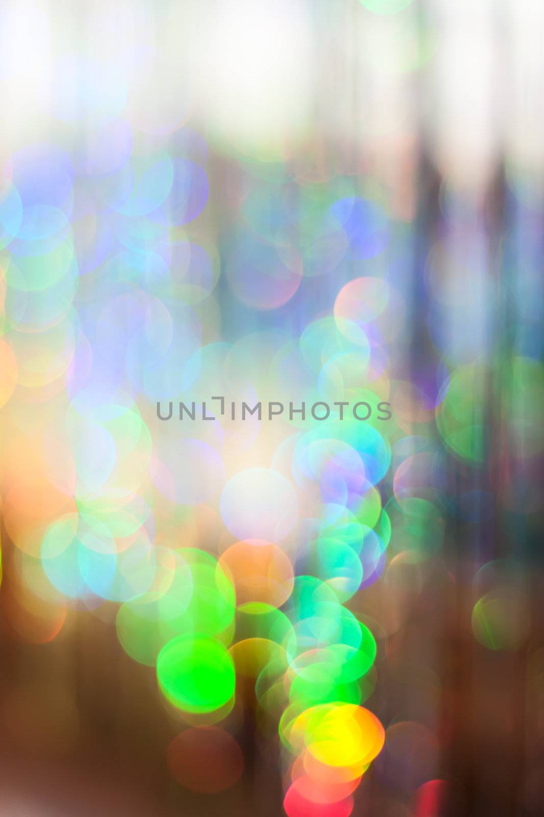 Colored sparkles. Photo bokeh in Sunny day