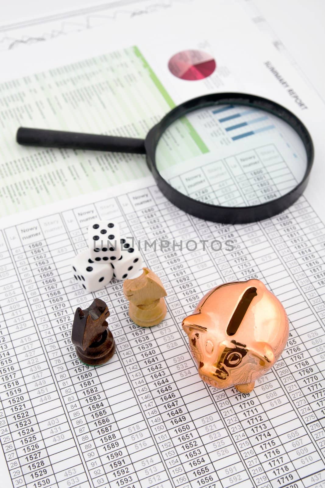 Business concept with magnifier and chess pieces on colorful background