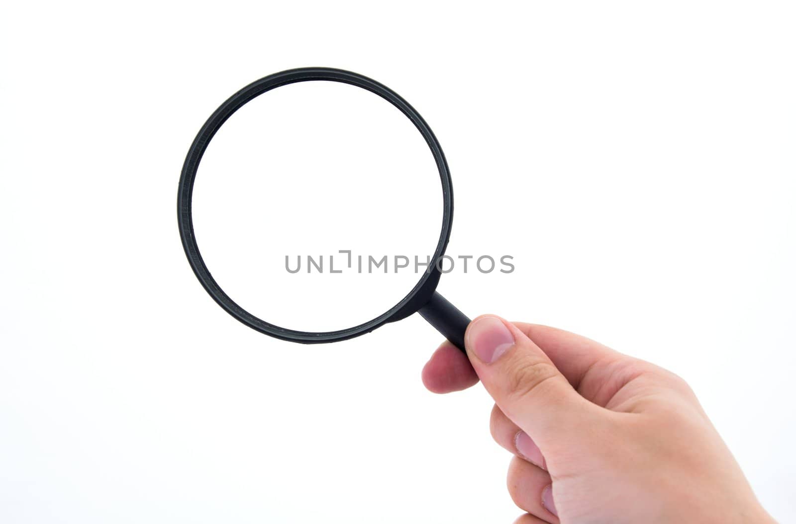 Hand holding magnifier isolated on white