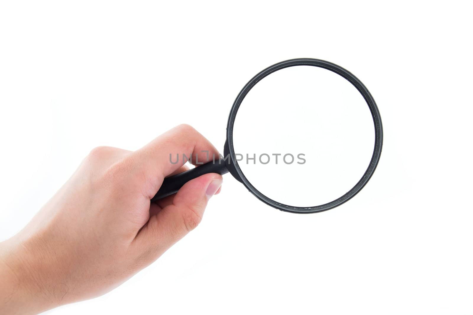 Hand holding magnifier isolated on white by simpson33