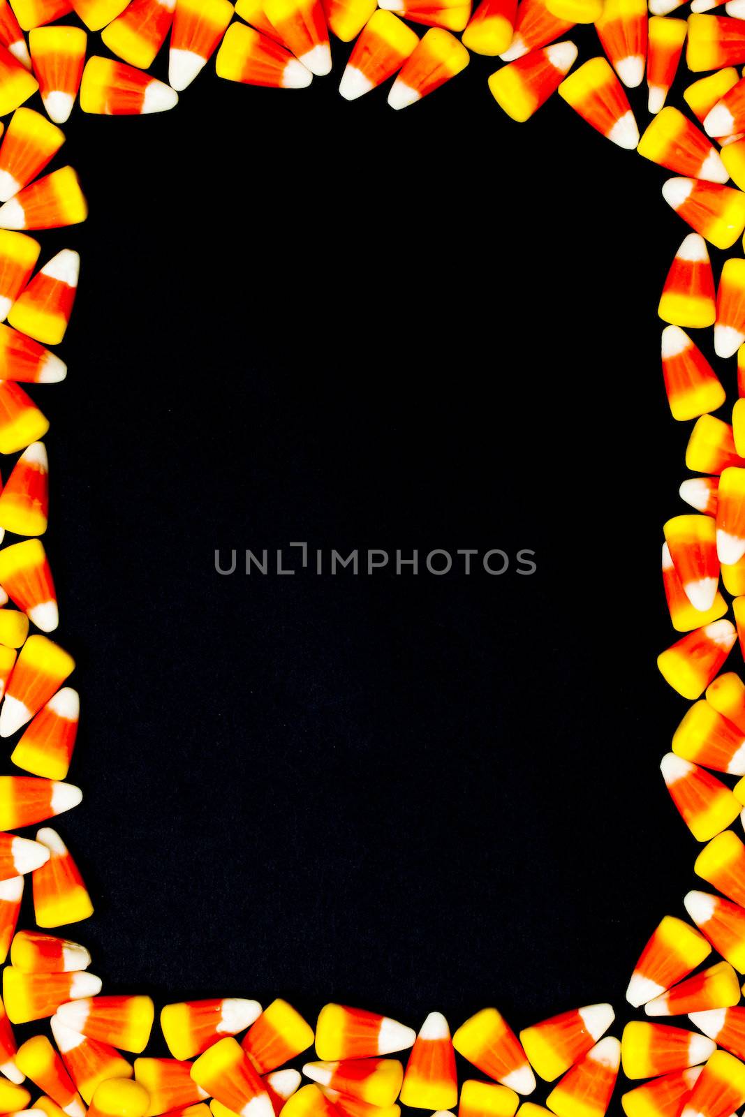 Close-up of arranged candy corn.
