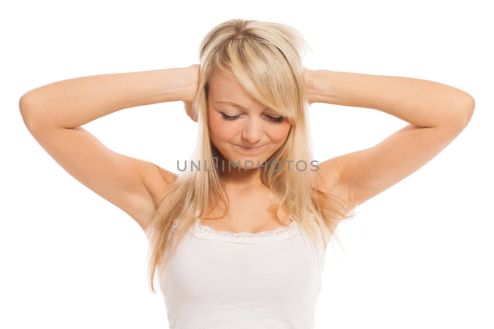 Young attractive woman closes ears with hand isolated over white background