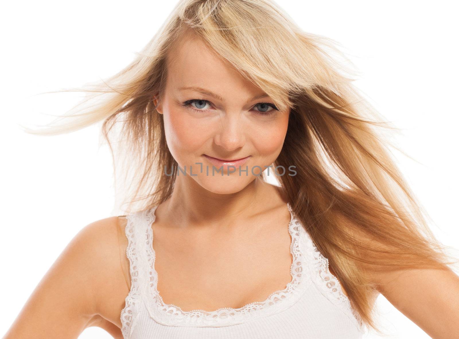 Young attractive woman posing isolated over white background