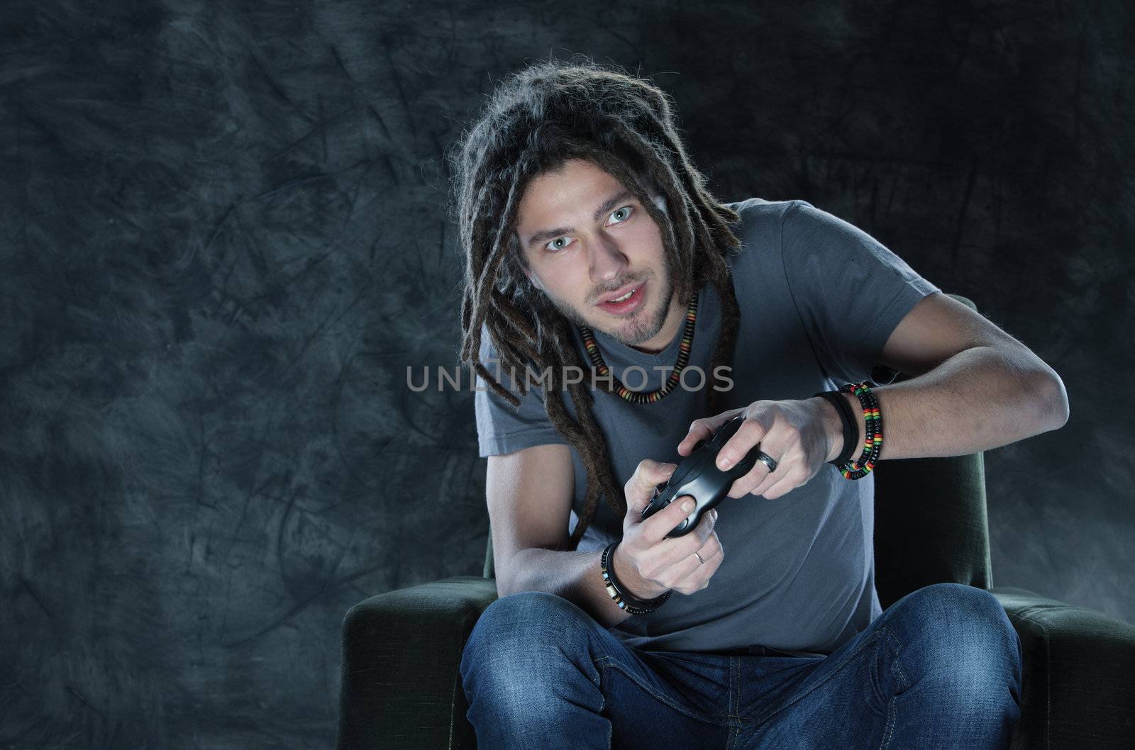 Young man playing Videogames