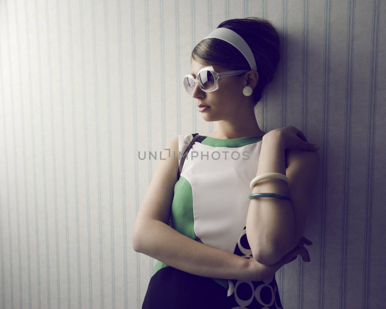 Portrait of woman with retro sunglasses. 1960 style