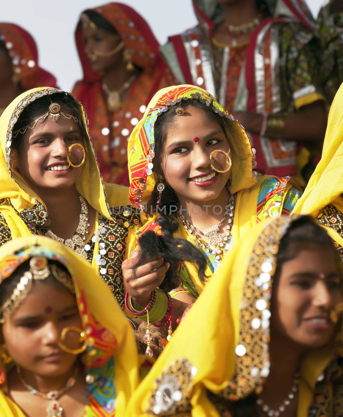 PUSHKAR, INDIA - NOVEMBER 21:  An unidentified girls in colorful ethnic attire attends at the Pushkar fair on November 21, 2012 in Pushkar, Rajasthan, India.