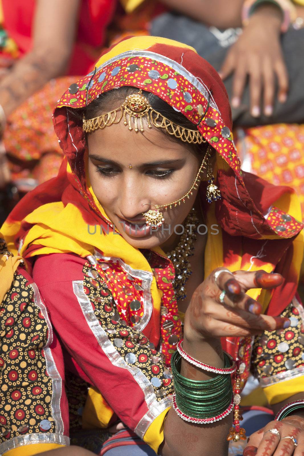 Indian girl in colorful ethnic attire by vladimir_sklyarov