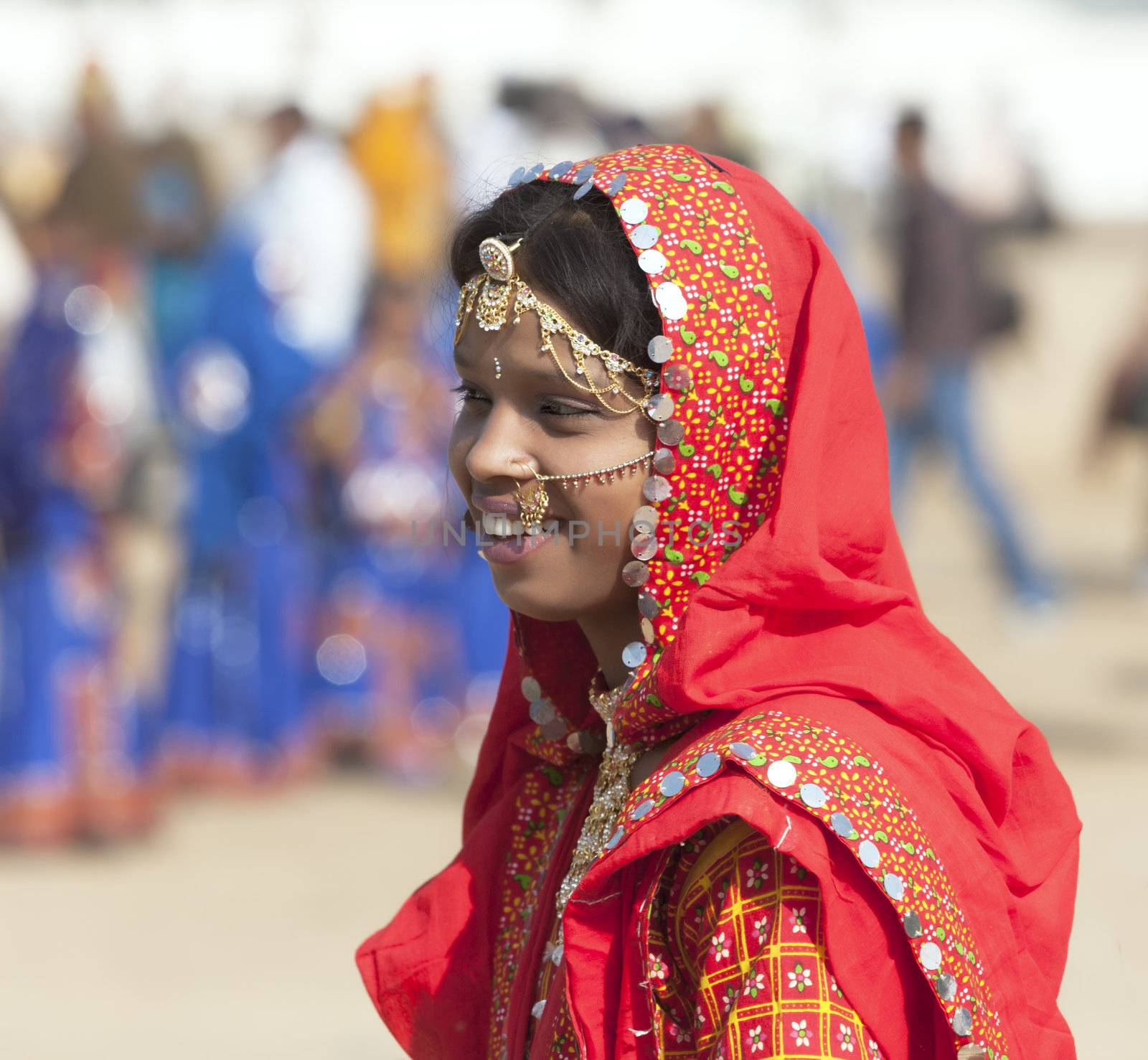 PUSHKAR, INDIA - NOVEMBER 21:  An unidentified girl in colorful ethnic attire attends at the Pushkar fair on November 21, 2012 in Pushkar, Rajasthan, India.