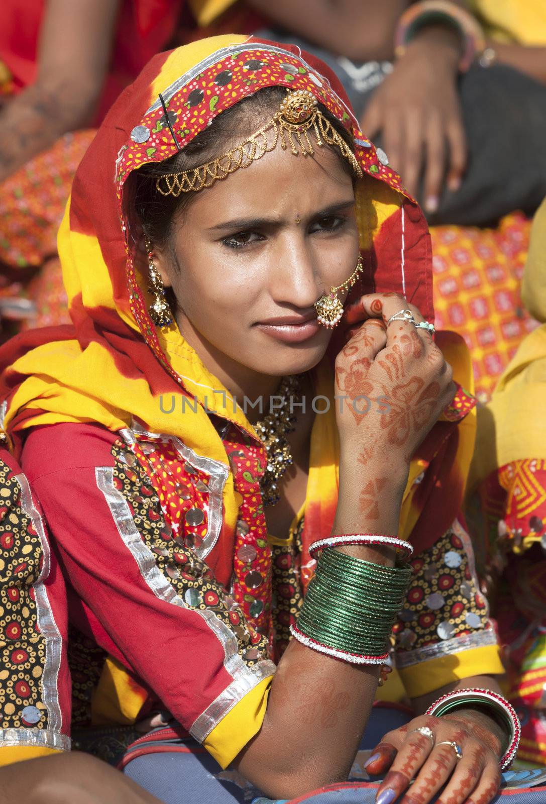 Indian girl in colorful ethnic attire by vladimir_sklyarov