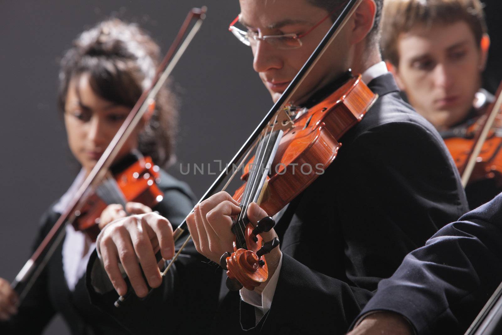 Classical music. Violinists in concert by stokkete