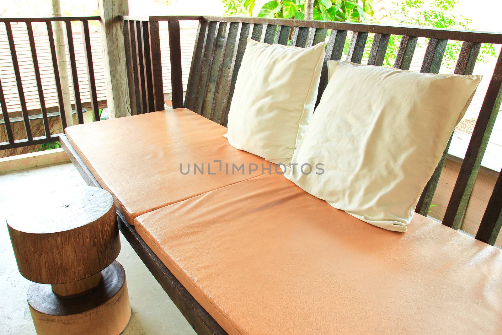 Relaxing seat sofa with pillows on terrace