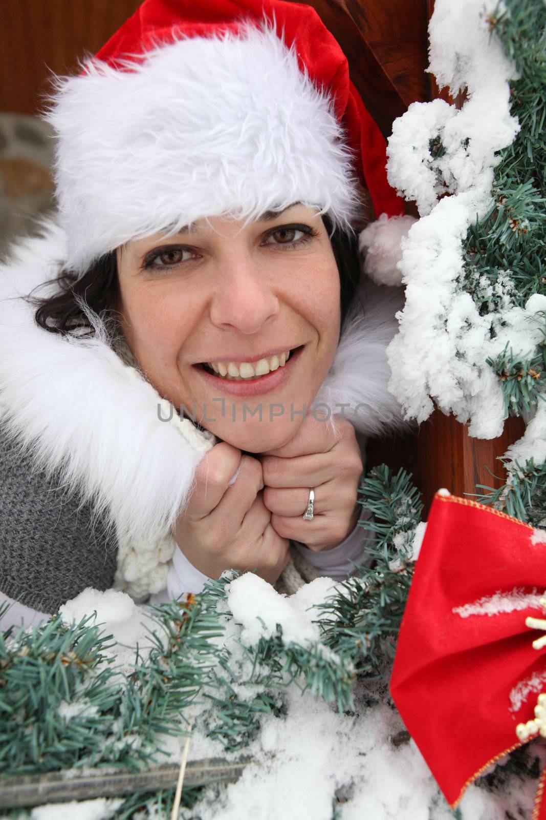 Jolly woman celebrating Christmas