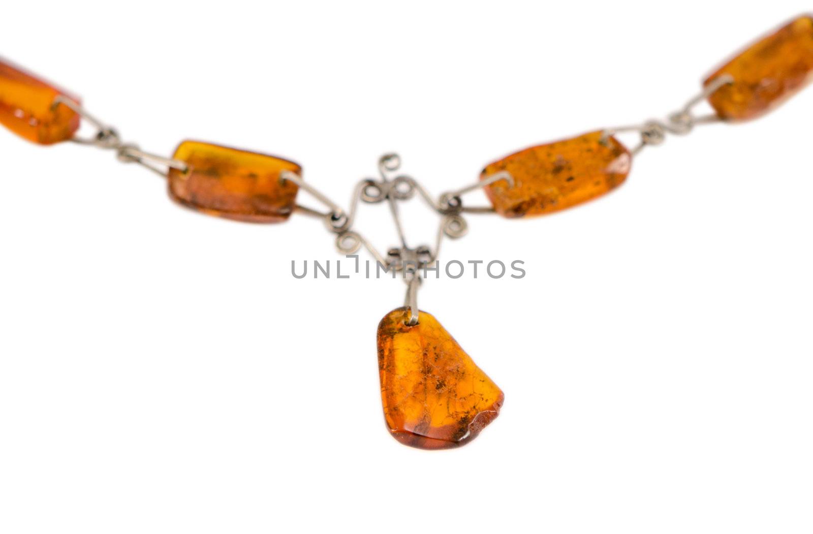 amber stone blurred necklace isolated on white background.
