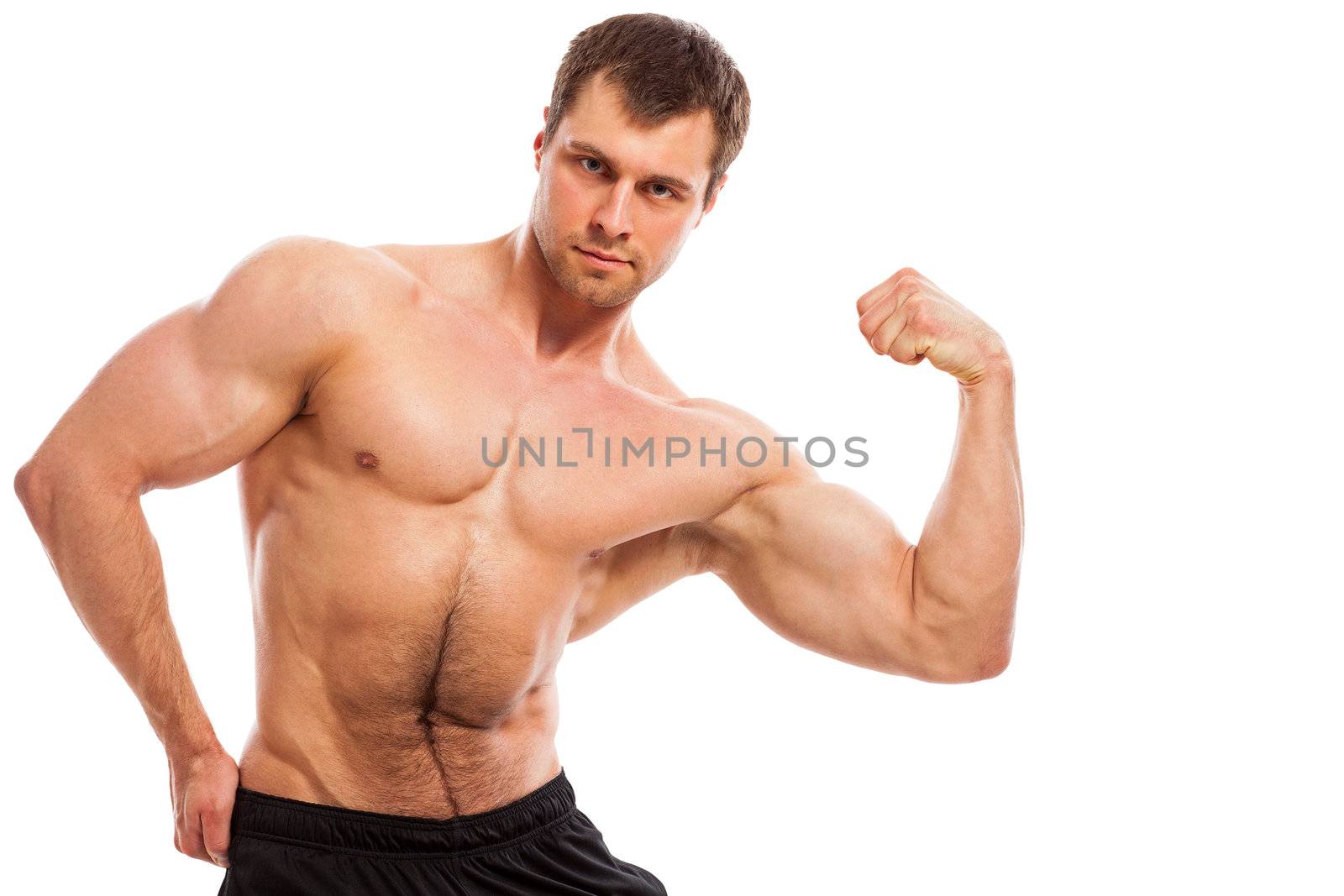 Handsome muscular guy with naked torso isolater over a white background