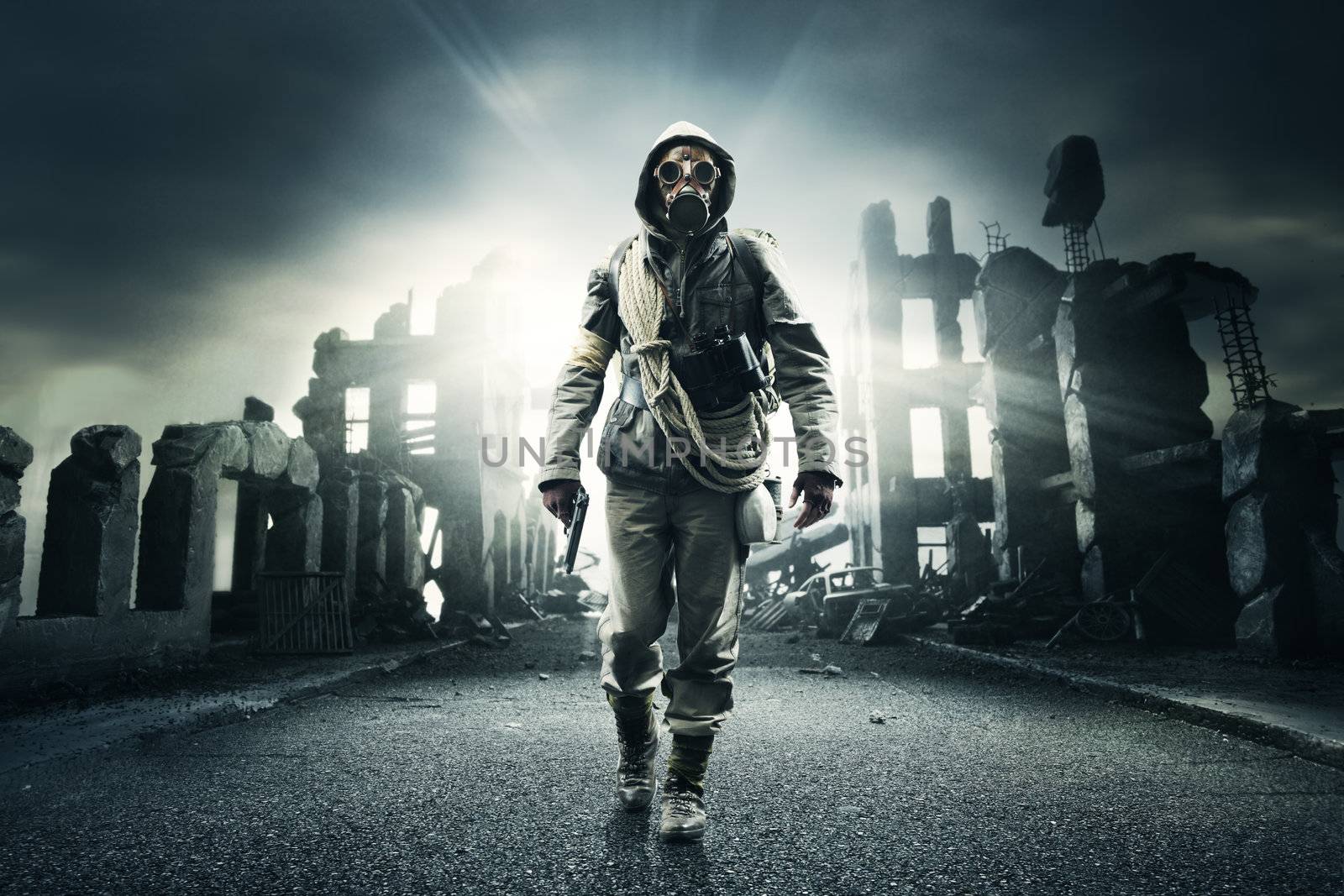 Post apocalyptic survivor in gas mask, destroyed city in the background