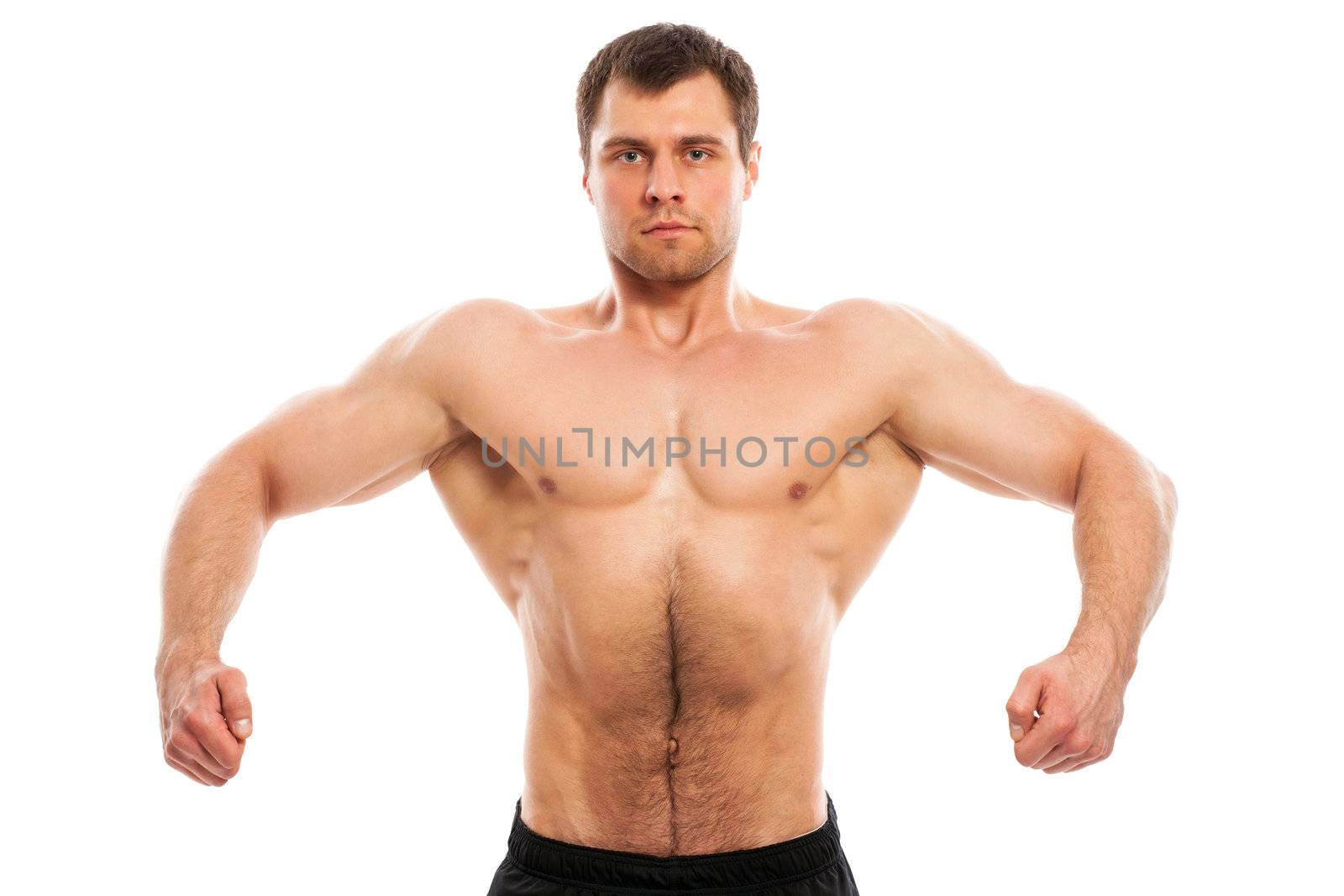 Handsome muscular guy with naked torso isolater over a white background