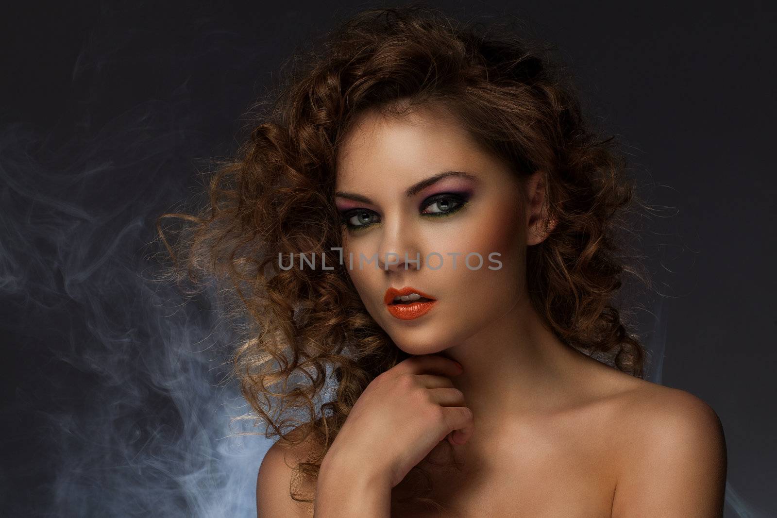 Beautiful woman with curls and makeup by rufatjumali