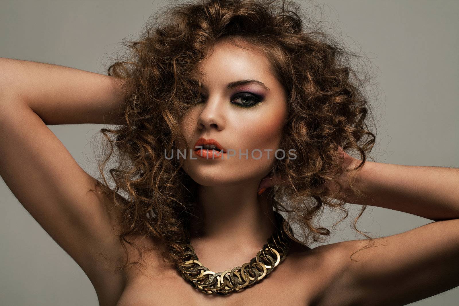 Beautiful woman with curls and makeup by rufatjumali