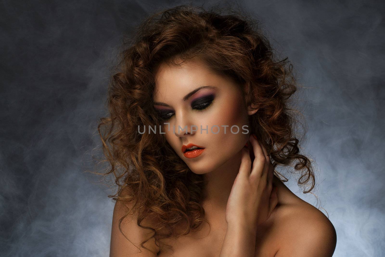 Beautiful woman with curls and makeup by rufatjumali