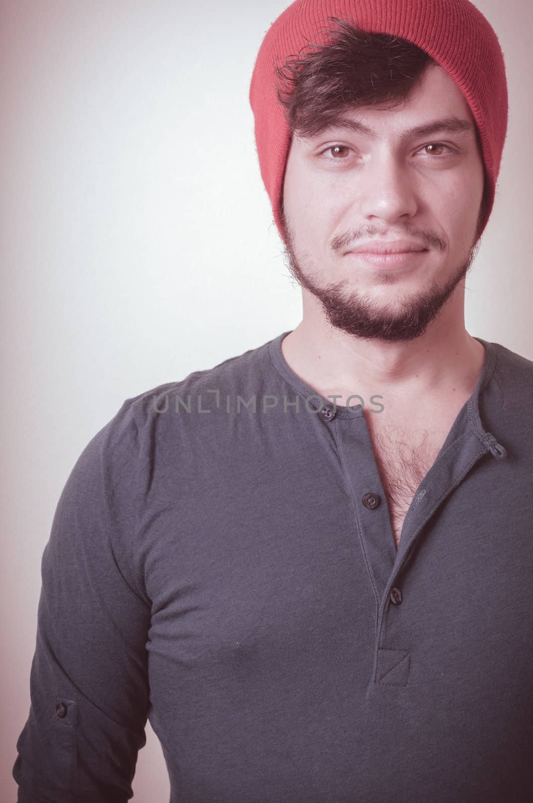 young modern stylish man on vignetting background