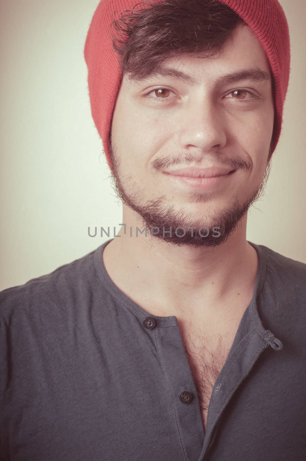 young modern stylish man on vignetting background