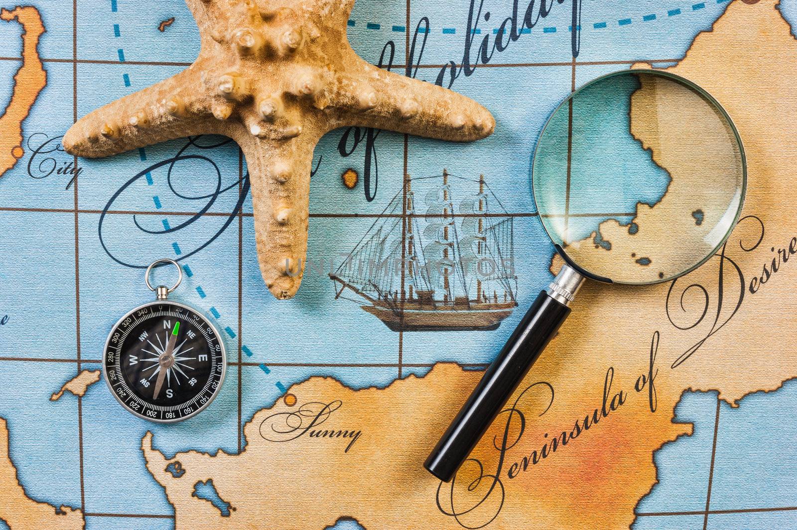 Still life with things leisure and travel on a background of map