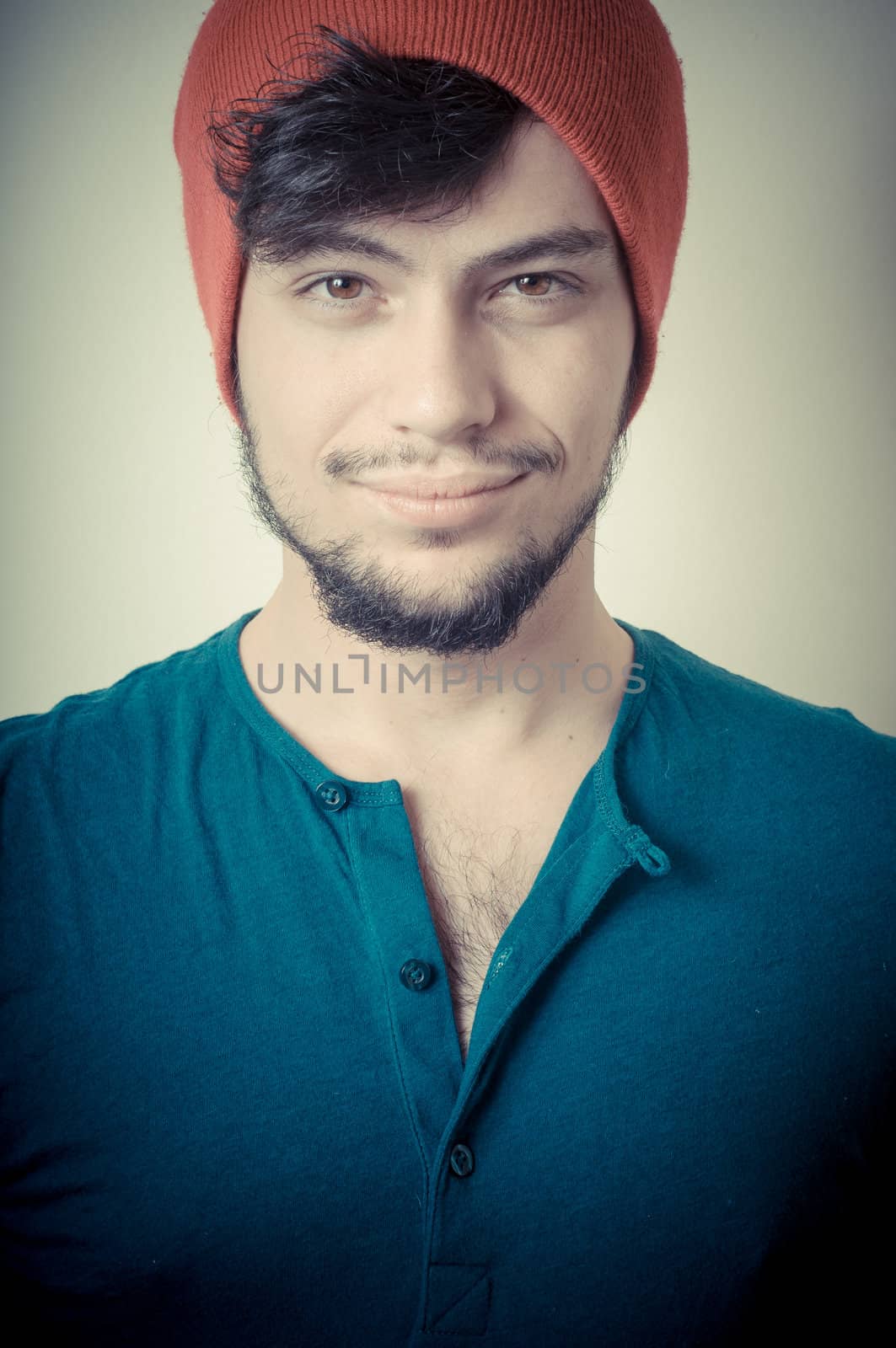 young modern stylish man on vignetting background