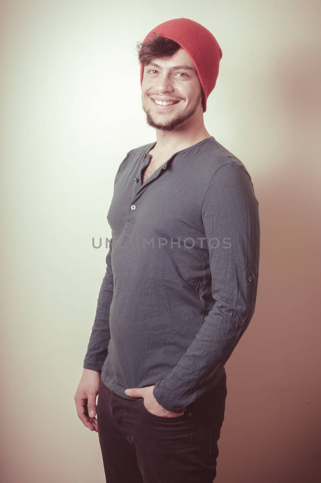 young modern stylish man on vignetting background