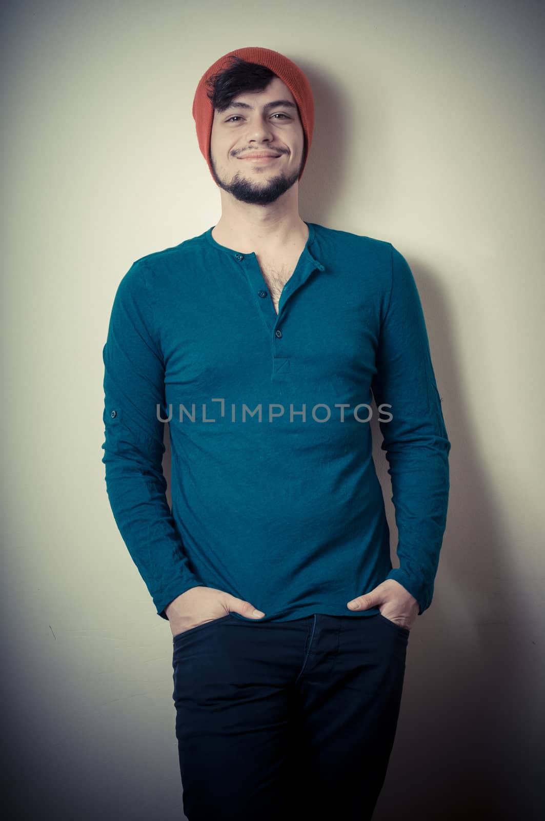 young modern stylish man on vignetting background