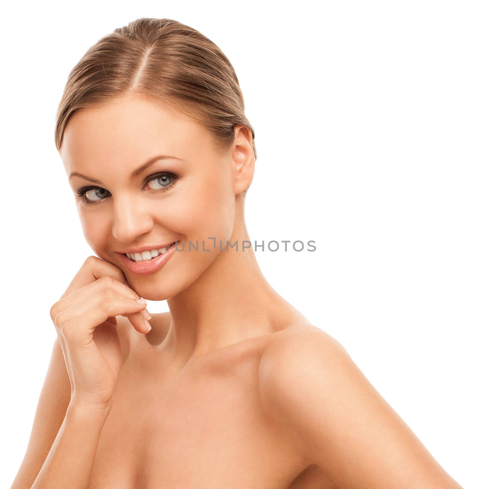 Beautiful young caucasian woman with natural makeup isolated over white background