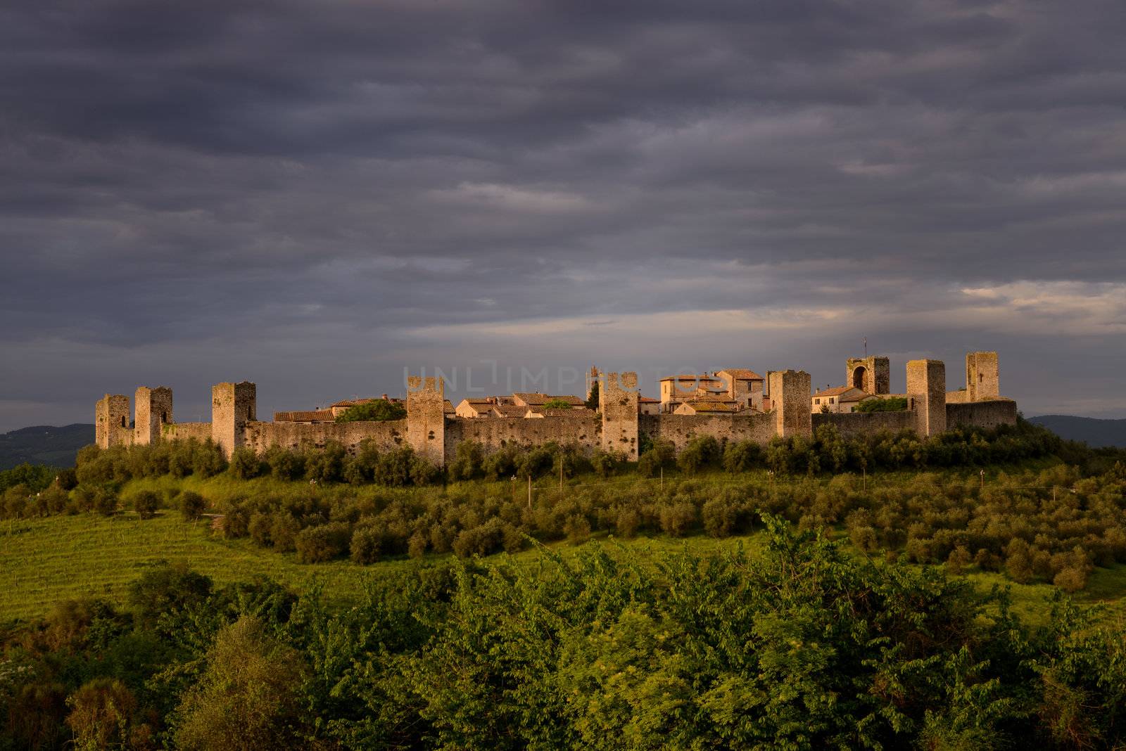 Photos of Monteriggioni, a medieval walled town located on a natural hillock, in the Siena Province of Tuscany