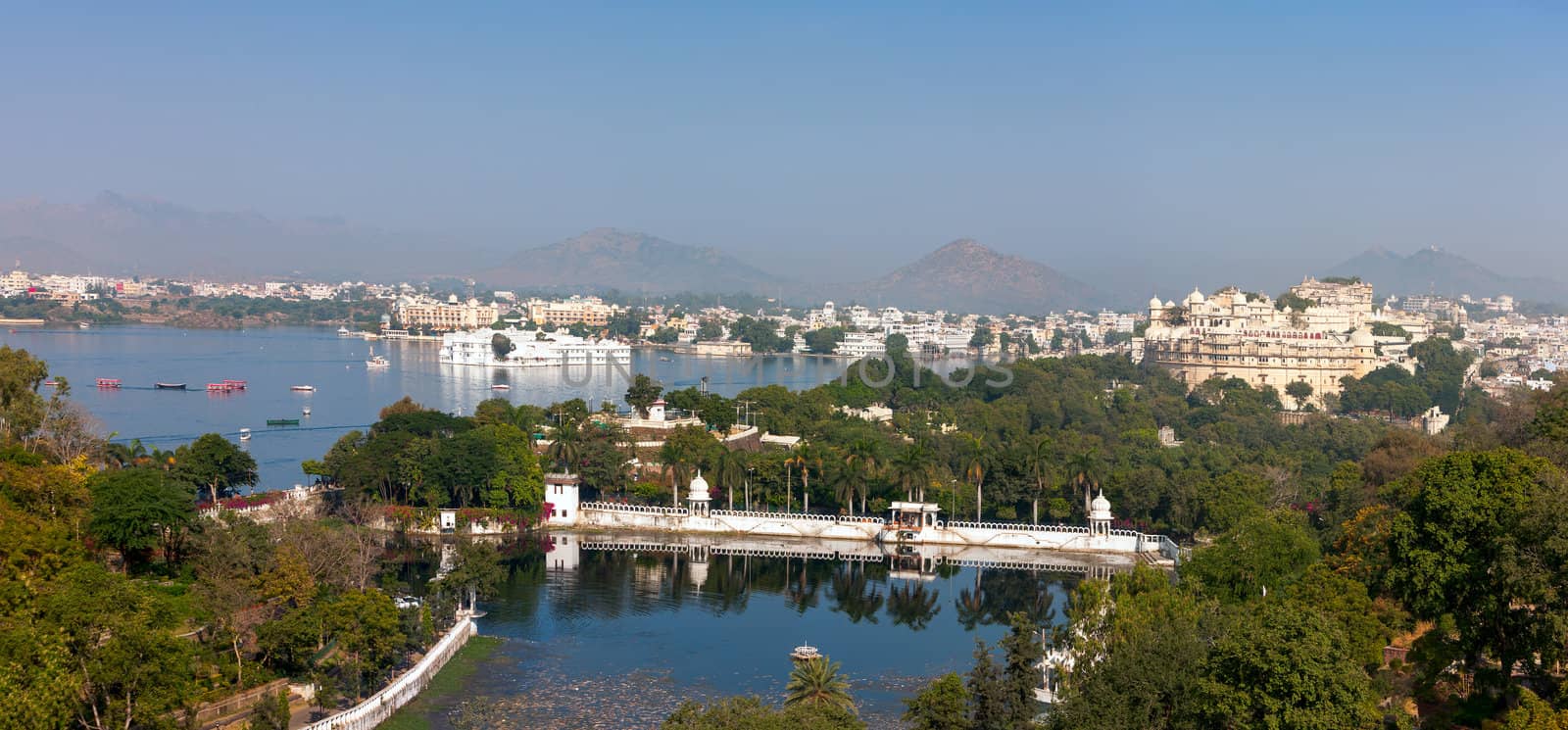 Udaipur. View of Lake Pichola, City Palace and Taj Lake Palace.  by vladimir_sklyarov