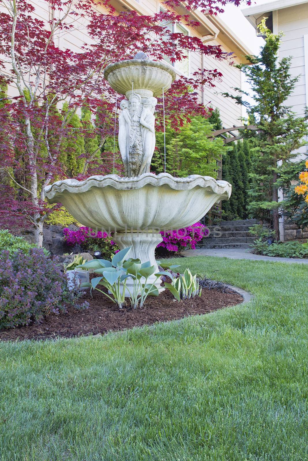Renaissance Water Fountain on Front Lawn Landscaping with Trees and Flowering Shrubs